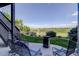 Cozy outdoor patio with comfortable seating and lush green surroundings at 15046 Verbena St, Thornton, CO 80602