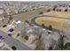 Aerial view of a residential neighborhood with community amenities in close proximity at 12524 Forest Dr, Thornton, CO 80241