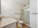 Clean bathroom with a glass-enclosed shower and marble-style vanity at 725 S Alton Way # 7D, Denver, CO 80247
