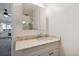 Bathroom with marble-style vanity and medicine cabinet at 725 S Alton Way # 7D, Denver, CO 80247