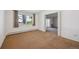 Bedroom with a large window allowing for natural light and access to the balcony at 725 S Alton Way # 7D, Denver, CO 80247