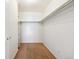 Empty walk-in closet with built-in shelving and ample storage space at 725 S Alton Way # 7D, Denver, CO 80247