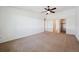 Spacious main bedroom with ceiling fan and ensuite bathroom at 725 S Alton Way # 7D, Denver, CO 80247