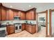 Well-appointed kitchen with custom cabinetry, stainless steel appliances, and an open layout to the living space at 209 S Lincoln St, Denver, CO 80209