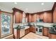 Modern kitchen with stainless steel appliances, custom cabinets, and ample counter space at 209 S Lincoln St, Denver, CO 80209