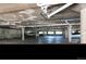 A spacious garage with cars parked inside at 1300 S Monaco Pkwy # 12, Denver, CO 80224