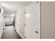 Hallway with access to the stairs at 1300 S Monaco Pkwy # 12, Denver, CO 80224