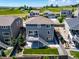 Aerial view shows a well-maintained backyard with a deck, patio, and landscaping, offering a private outdoor retreat at 18189 House Finch Ln, Parker, CO 80134