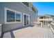 The sliding glass doors from the house lead to this spacious backyard deck at 18189 House Finch Ln, Parker, CO 80134