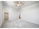 Cozy bedroom featuring soft carpet, ample natural light and an ensuite bathroom at 18189 House Finch Ln, Parker, CO 80134