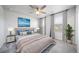 Serene bedroom offers a ceiling fan and comfortable décor that creates a calming, restful environment at 18189 House Finch Ln, Parker, CO 80134
