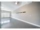 A clean, spacious garage boasts a finished floor and ample storage, ready for your vehicles and projects at 18189 House Finch Ln, Parker, CO 80134