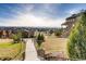 Backyard with a view of the mountains and walking path in a residential area at 3491 Cascina Pl # D, Highlands Ranch, CO 80126