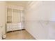 Organized walk-in closet with built-in shelving and drawers maximizes space for storage at 3491 Cascina Pl # D, Highlands Ranch, CO 80126