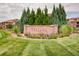 Elegant Tresana community sign surrounded by lush landscaping at 3491 Cascina Pl # D, Highlands Ranch, CO 80126