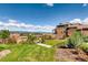 Exterior view of community with lush landscaping and mountain views at 3491 Cascina Pl # D, Highlands Ranch, CO 80126