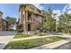 Stunning multi-story townhome features a stone facade, balcony and professional landscaping at 3491 Cascina Pl # D, Highlands Ranch, CO 80126