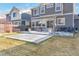 Spacious backyard featuring a grey concrete patio perfect for outdoor entertaining at 13563 E 106Th Pl, Commerce City, CO 80022
