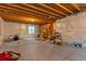 Unfinished basement, ready for customization and featuring exposed rafters at 13563 E 106Th Pl, Commerce City, CO 80022
