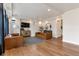 Spacious living room with recessed lighting, hardwood floors, modern furnishings, and bright windows at 13563 E 106Th Pl, Commerce City, CO 80022
