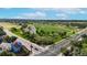 Aerial view of park with open green space, walking paths, and picnic spots; recreational area at 10718 Ash Ct, Thornton, CO 80233