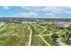 Gorgeous aerial view showing the area's lush landscaping, walking trails, and water features at 10718 Ash Ct, Thornton, CO 80233