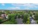 Aerial view of the home situated in a mature neighborhood with tree-lined streets at 10718 Ash Ct, Thornton, CO 80233