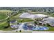 Aerial photo of the recreation area and park with a beautiful lake and play areas at 10718 Ash Ct, Thornton, CO 80233