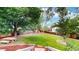 Spacious backyard with a play structure and picnic table, perfect for Gathering fun and relaxation at 10718 Ash Ct, Thornton, CO 80233