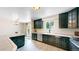 Clean kitchen featuring updated cabinets and stainless steel appliances at 10718 Ash Ct, Thornton, CO 80233