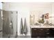 Modern bathroom with tiled shower and double sink vanity at 3220 Zuni St, Denver, CO 80211