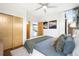 Comfortable bedroom boasts a ceiling fan, natural light, and ample closet space, offering a serene retreat at 3220 Zuni St, Denver, CO 80211