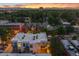 Modern home featuring a flat roof, with mountain views in the background, showcasing contemporary architecture at 3220 Zuni St, Denver, CO 80211