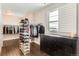 Large walk-in closet with ample shelving and hanging space at 9724 Cantabria Pt, Lone Tree, CO 80124