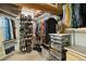 Large walk-in closet with ample shelving and hanging space at 1143 Auraria Pkwy # 402, Denver, CO 80204