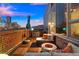 Relaxing rooftop patio offering stunning city skyline views at 1143 Auraria Pkwy # 402, Denver, CO 80204