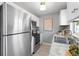 Modern kitchen with stainless steel appliances and granite countertops at 3137 S Glencoe St, Denver, CO 80222