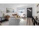 Well-lit living room with stylish furniture, sleek flooring, and an inviting atmosphere at 3137 S Glencoe St, Denver, CO 80222