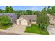 Beautifully landscaped home with an attached two-car garage, offering curb appeal at 12229 W Berry Ave, Littleton, CO 80127