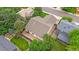 Birds-eye view of the back exterior and backyard featuring low maintenance landscaping at 12229 W Berry Ave, Littleton, CO 80127