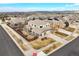 Aerial shot highlights the homes layout, landscaped yards, and driveway at 15753 E Indian Brook Cir, Parker, CO 80134