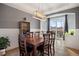 Dining area with hardwood table, chairs, and slider to patio at 15753 E Indian Brook Cir, Parker, CO 80134