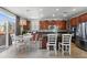 Open kitchen with stainless steel appliances and a breakfast nook at 15753 E Indian Brook Cir, Parker, CO 80134