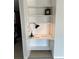 Built-in desk nook features a lamp and shelving, ideal for a home office at 9700 E Iliff Ave # D44, Denver, CO 80231