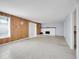 Bright living room featuring mixed flooring and white fireplace at 9700 E Iliff Ave # D44, Denver, CO 80231