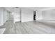 Open-concept living area offers tiled floors and built-in shelves for storage at 9700 E Iliff Ave # D44, Denver, CO 80231