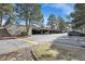 View of covered community parking and a parked SUV at 9700 E Iliff Ave # D44, Denver, CO 80231