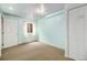 This finished basement features a neutral carpet and a closet for storage at 718 Julian Cir, Lafayette, CO 80026