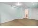 This finished basement features a neutral carpet, closet, and easy access to a bathroom at 718 Julian Cir, Lafayette, CO 80026
