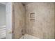 A stylish bathroom features modern tile, new fixtures and shower head at 718 Julian Cir, Lafayette, CO 80026
